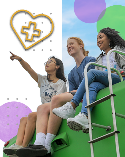 Three young people sit on top of an RV and look ahead at all the possibilities for their futures.